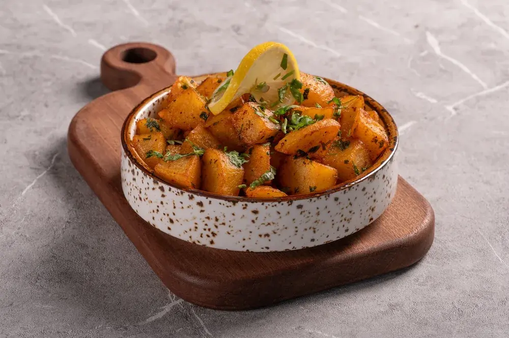 بطاطا حارة — مطعم كباب أربيل العراقي دبي